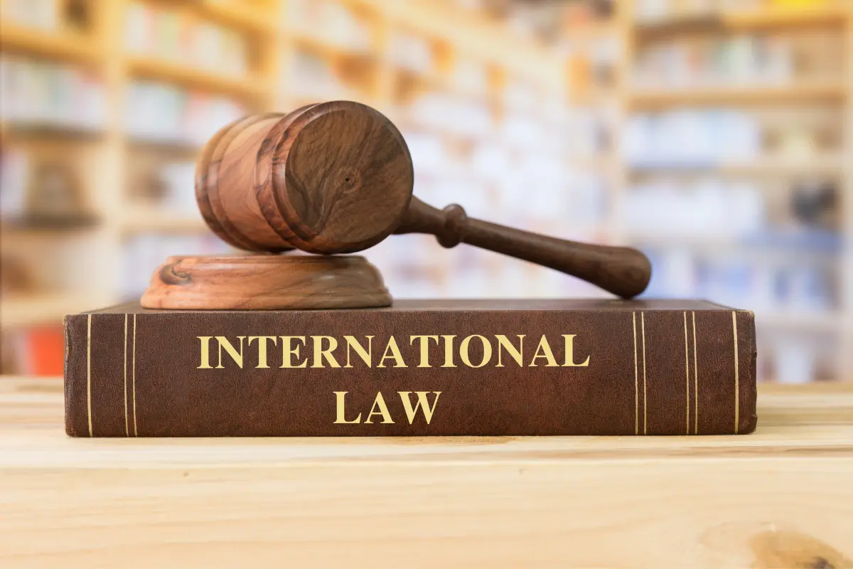9. ‘A’ an armed forces officer of state ‘X’ sold confidential documents to foreign agents and escaped to state ‘Y’. In spite of an extradition treaty between ‘X’ and ‘Y’ states, the ‘y’ state refused to extradite ‘A’ to ‘X’. Discuss the legal position of extradition in the above case.